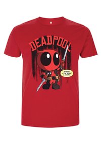 Red cotton t-shirt featuring a cartoon character with large eyes, holding swords, and text saying "WHEEE! LOOK WHAT I HAVE!" above.