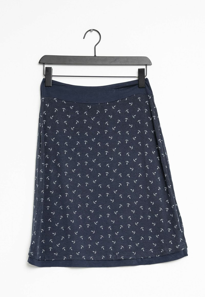 Granatowa spódnica bawełniana z elastycznym pasem, zdobiona powtarzającym się, małym białym wzorem kotwicy na całej powierzchni. Wisząca na czarnym plastikowym wieszaku.