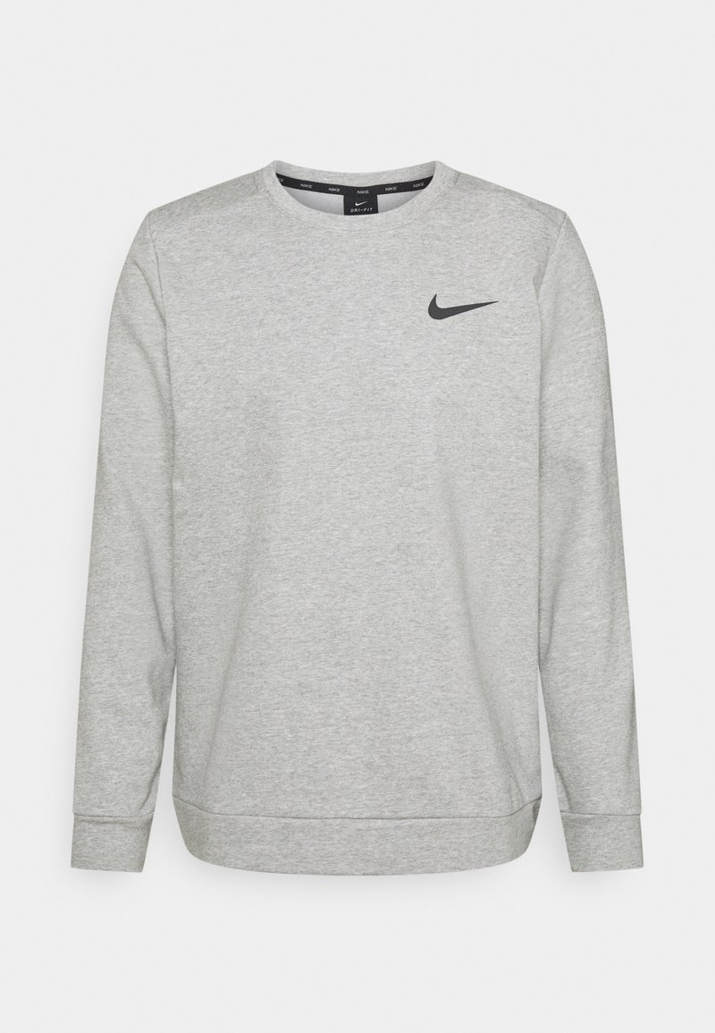 Sudadera de manga larga Nike de color gris claro con cuello redondo y logo de swoosh negro en el lado izquierdo del pecho.