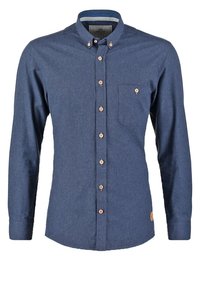 Pánská košile s dlouhým rukávem v tmavě modré barvě. Má náprsní kapsu, dřevěné knoflíky a kulatou nášivku s logem na spodní straně.