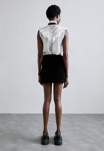 Alice + Olivia Mini skirts  - black