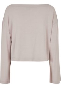 Lyse rosa, kortermet topp med lange ermer laget av mykt stoff. Har en bred utringning og løs passform med minimal sømdetalj.