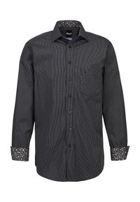 Camicia nera a maniche lunghe con motivo a scacchi, caratterizzata da una stampa floreale a contrasto sul colletto interno e sui polsini. Taschetta singola sul petto.