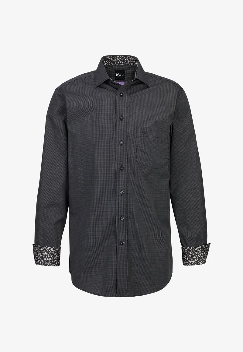 Camicia nera a maniche lunghe con motivo a scacchi, caratterizzata da una stampa floreale a contrasto sul colletto interno e sui polsini. Taschetta singola sul petto.