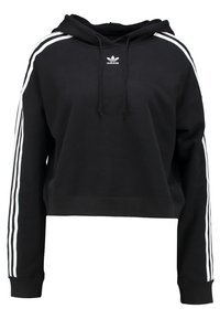 Black cropped hoodie made of cotton, featuring white three-stripe design along the sleeves. Includes a drawstring hood and a small logo.