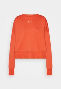 Pomarańczowa bluza z miękkiego materiału, o skróconym fasonie, z długimi rękawami, ściągaczami na mankietach oraz białym logo Nike na piersi.