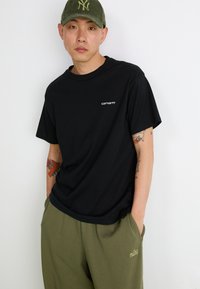 Nike Sportswear CLUB CUFF PANT  - Treniņtērpa apakšdaļas - clay green/seaweed
