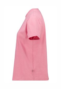 Pink cotton t-shirt with short sleeves, a round neck, a relaxed fit, and a small tag on the hem. Flat texture and solid color.