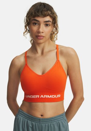 VANISH SEAMLESS LOW - Sport-bh met light support - orange base