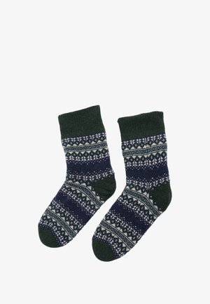 Zelena in mornarsko modra nogavica s potiskom in rebrastimi robovi; vsebuje geometrijske in cvetlične vzorce. Narejene so iz mehkega pletenega materiala.