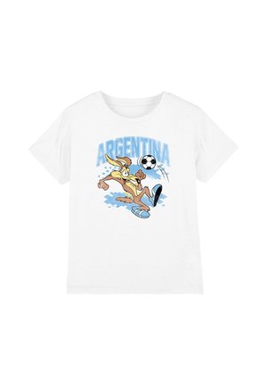 White t-shirt with a cartoon coyote kicking a soccer ball and the word Argentina in large blue letters above.