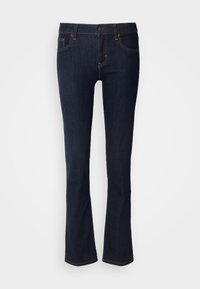 Los jeans acampanados de mezclilla oscura cuentan con un cierre de botón, diseño de cinco bolsillos, costuras en contraste y una textura suave.
