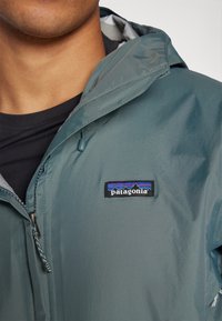 Patagonia TORRENTSHELL RAIN - Jachetă hardshell - grün