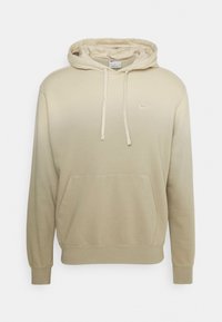 Felpa con cappuccio beige realizzata in morbido misto cotone. Presenta una tasca frontale a marsupio, coulisse e un piccolo logo bianco sul petto.