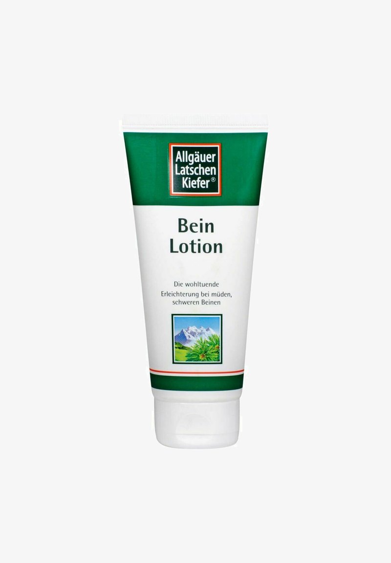 Tube der Allgäuer Latschenkiefer Beinlotion mit grüner und weißer Verpackung, Text auf Deutsch und einer Illustration eines alpinen Berges und eines Kieferzweigs.