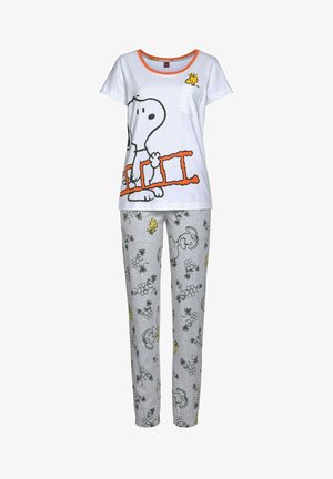 White cotton pajama set featuring a Snoopy graphic on the top. Grey pants with floral and character patterns in black and yellow accents.
