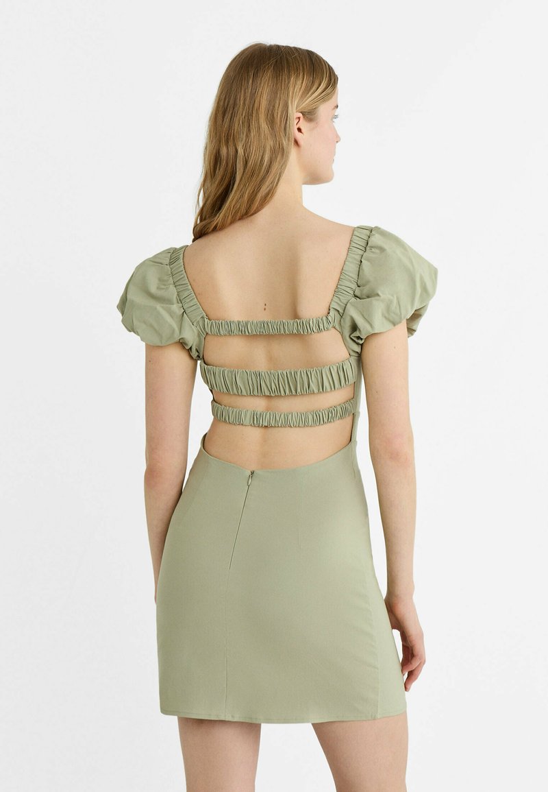 stradivarius green dress Stradivarius SHORT OPEN-BACK WITH ELASTICATED DETAILS - Shift dress - light  green