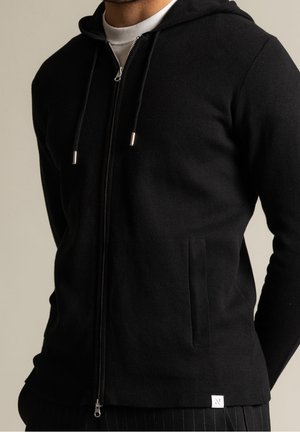 Verryttelytakki - black