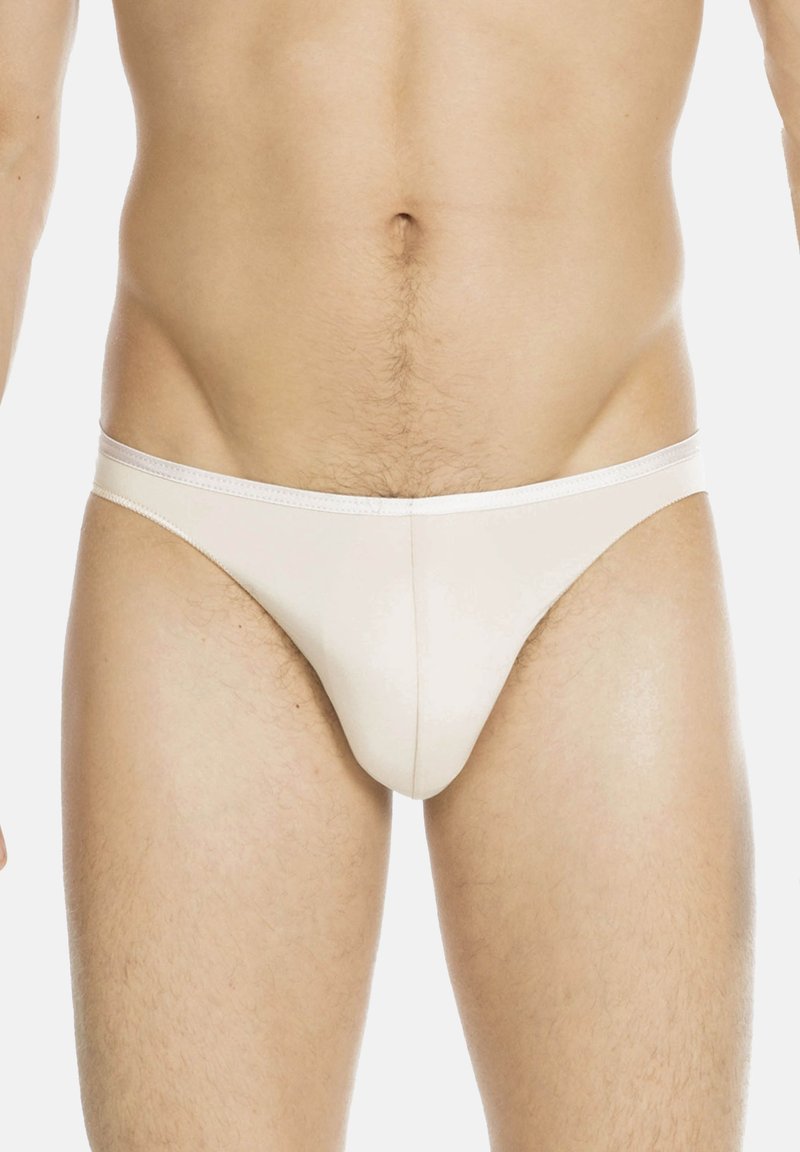 Weiße Baumwollslips mit klassischem Schnitt, einem glatten, elastischen Bund und minimalistischem Design, das eine taillierte Silhouette betont.