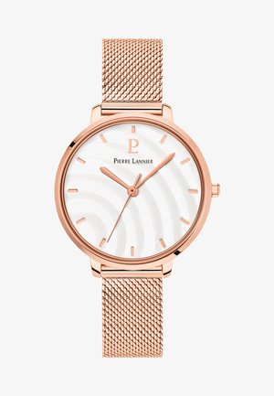 Ruusukullan värinen kello, jossa on verkkomainen hihna, valkoinen aaltoileva kellotaulu, minimalistiset tuntimerkit ja viisarit. Brandin nimi "Pierre Lannier" näkyy selvästi.