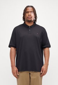 Tommy Hilfiger LIQUID ESSENTIAL  - Polo shirt - black