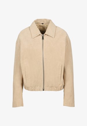 Beige suède cropped jas met ritssluiting aan de voorkant, puntige kraag, lange mouwen, twee verticale zakken en elastische zoom.