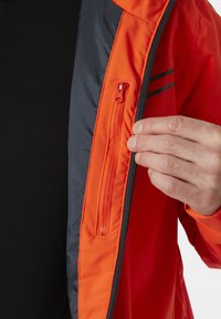 Helly Hansen ALPINE INSULATED - Lyžařská bunda - cherry tomato