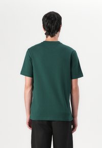 Tommy Hilfiger ESSENTIAL V NECK - Basic T-shirt - ornamental green