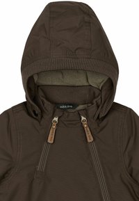 Bruine hoodie met een rits aan de voorkant, ribgebreide manchetten en leren trekdetails. Zachte, gestructureerde voering binnen de capuchon.