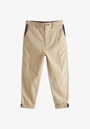 Bež pamuk hlače ravnog kroja s mornarsko plavim detaljima na bočnim džepovima i manžetama. Imaju prednje kopčanje na dugme i petlje za remen.