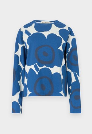 Blue long-sleeve shirt made of cotton, featuring large floral patterns in blue and navy on a white background. Round neckline, relaxed fit.