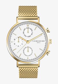 Geselecteerd, gold-coloured