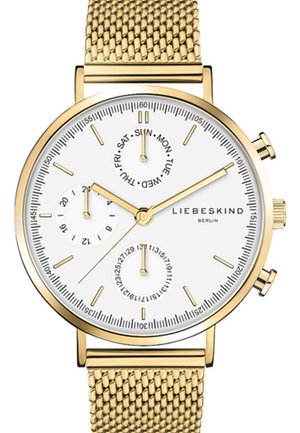 Montre dorée avec un cadran blanc, bracelet en maille, index horaires et deux sous-cadrans pour la date et le jour. Présente une finition métallique lisse.