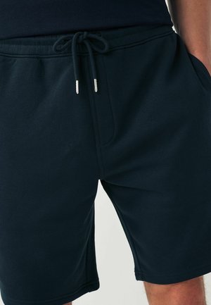 SOFT STANDARD - Tracksuit bottoms - navy