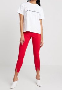 Missguided Leggings - Byxor - red