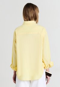 Calliope Hemdbluse - giallo limone