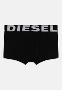 Svarta bomullskalsonger med en vit elastisk midjeband som har "DIESEL" i fet stil. Slät textur, tight passform och inga mönster.