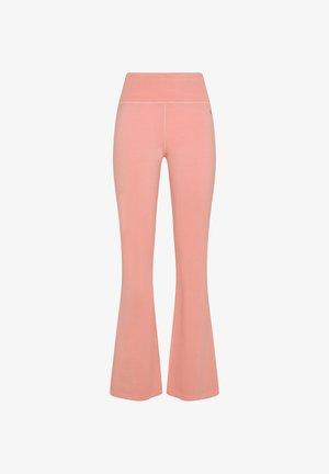 Růžové rozšířené jogínské kalhoty s širokým elastickým pasem. Vyrobené z měkké tkaniny s hladkým povrchem a jemnými švy.