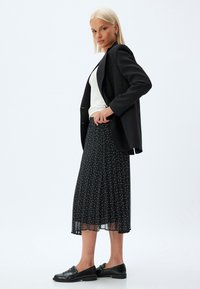 Koton Falda acampanada - black