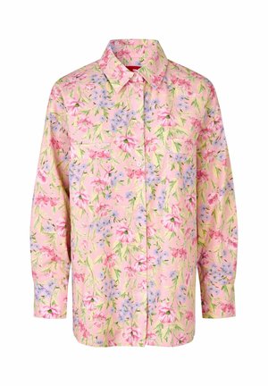 Chemise à manches longues boutonnée avec col pointu, fond rose et motif floral dans des tons de rose, violet et feuilles vertes.
