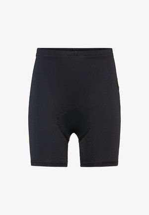 Shorts de cyclisme noirs rembourrés avec des détails de couture à l'entrejambe et une petite étiquette verte sur le côté droit.