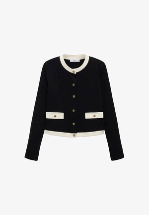 Black cropped jacket with cream accents, gold-tone buttons, round neckline, and two front pockets with button closures. Soft fabric, structured shape.