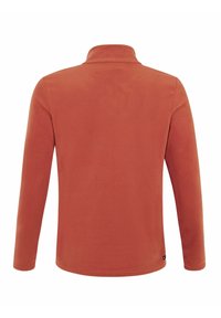 Fleece džemperis rudos oranžinės spalvos, su ilgomis rankovėmis ir aukštu apykaklės kraštu. Minkšta tekstūra su lygiu paviršiumi, minimalus prekės ženklas apatiniame krašte.