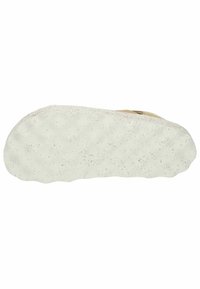 Podešev boty má strukturovaný, smetanově bílý gumový materiál s malými tečkami, ukazuje zaoblený okraj a vlnkový vzor podrážky.