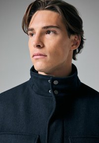 Next Jas - navy blue texture