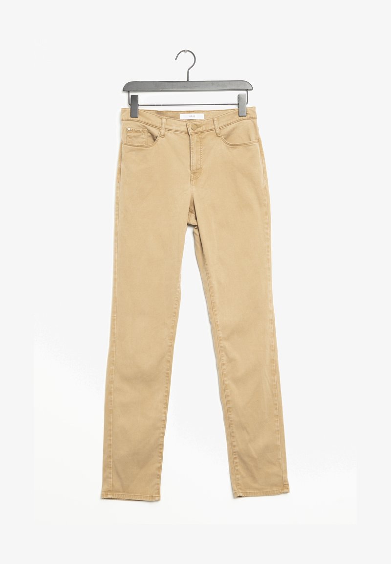 Beige cotton blend skinny jeans with a mid-rise waist, five pockets, and a clean design. Features a sturdy metal button and zipper.
