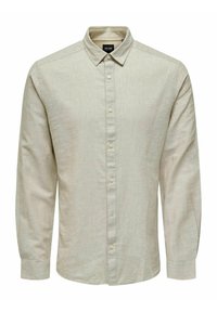 Jasny beżowy longsleeve z teksturowanej tkaniny. Posiada charakterystyczny kołnierzyk oraz zapięcie na guziki z przodu, z małymi guzikami.