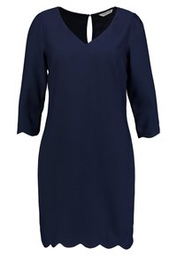 Mörkblå klänning med V-ringning, trekvartsärmar och nyckelhål i ryggen. Har en scalloped nederkant och slät textur.