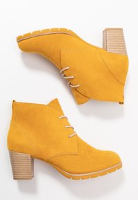 Marco Tozzi Kotníková obuv - yellow