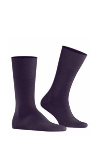 Due paia di calzini viola scuro esposti in posizione verticale, con polsini a coste e una texture liscia, su uno sfondo bianco.